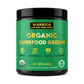Green container of Warrior Strong Wellness Organic Superfood Greens on a white background